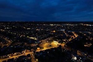 Beautiful Night Aerial View of Illuminated Roads  and Houses over Luton City of England , UK.  High Angle Footage photo