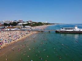 High Angle Sea View Beach Front with People at Bournemouth City of England UK, Aerial Footage of British Ocean photo
