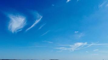 Beautiful Blue Sky and few clouds over Luton City of England on Hot Summer Day photo