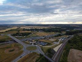 Aerial View and High Angle Footage of British Motorways Interchange of M1 Junction 11a at North Luton City of England UK. photo