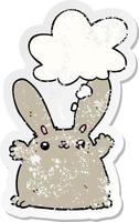 cartoon rabbit and thought bubble as a distressed worn sticker vector