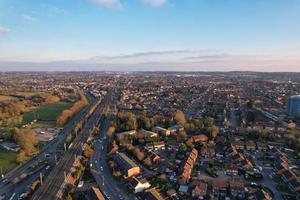 Gorgeous Aerial View of Luton City of England UK at Sunset Time, Colourful Clouds high angle footage taken by drone photo