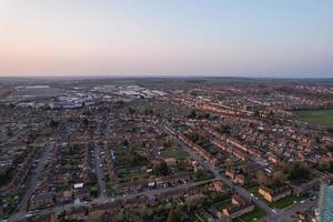 Gorgeous Aerial View of Luton City of England UK at Sunset Time, Colourful Clouds high angle footage taken by drone photo