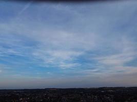 Aerial View of Luton City of England UK at Sunset Time, Colourful Clouds high angle footage taken by drone photo