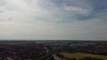 Aerial view of Luton Town with High Angle Footage of Train and Track Passing through city of England UK photo