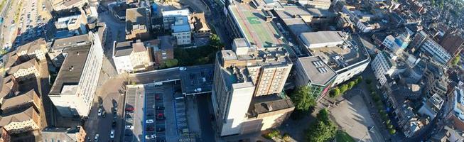 High Angle Drone's View of Luton City Center and Railway Station, Luton England. Luton is town and borough with unitary authority status, in the ceremonial county of Bedfordshire photo