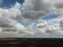 Most Beautiful Sky with Thick Clouds over British Town on a Hot Sunny Day photo