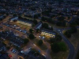 Aerial view high angle footage of Luton Town of England at Night photo