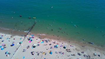 People relaxing at Bournemouth Beach of England UK photo