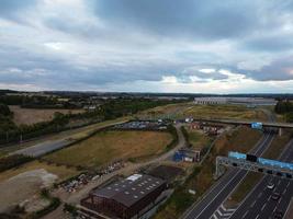 Aerial View and High Angle Footage of British Motorways Interchange of M1 Junction 11a at North Luton City of England UK. photo