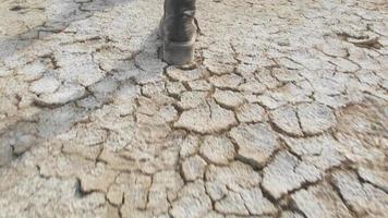 Young pretty caucasian woman walks on mud volcanoes. Travel destination in Georgia - Chachuna managed reserve video