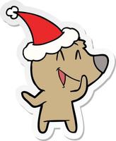 laughing bear sticker cartoon of a wearing santa hat vector