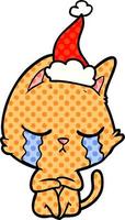 crying comic book style illustration of a cat sitting wearing santa hat vector