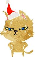 tough retro cartoon of a cat wearing santa hat vector