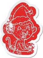 crazy cartoon distressed sticker of a monkey sitting wearing santa hat vector
