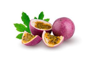 Whole passionfruit and a half of maracuya isolated on white background. photo