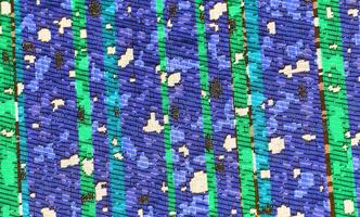 Detailed close up view on samples of cloth and fabrics in different colors found at a fabrics market photo
