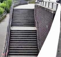 Different outdoor views on concrete, wooden and metal stairways. photo