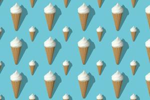 Seamless pattern of white ice creams isolated on blue background. Many white ice creams with shadow rendering 3D. The concept of taste of summer. photo