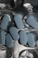 Píldoras médicas azules fondo de cerca impresiones de metal modernas impresiones de alta calidad de gran tamaño píldoras redondas macro carteles de pared de farmacia decoración del hogar foto