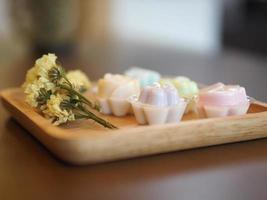 jelly desserts with a set of tea on the table. photo