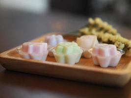 jelly desserts with a set of tea on the table. photo