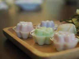 jelly desserts with a set of tea on the table. photo