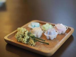 jelly desserts with a set of tea on the table. photo