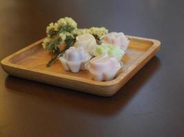 jelly desserts with a set of tea on the table. photo