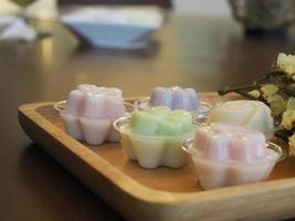 jelly desserts with a set of tea on the table. photo