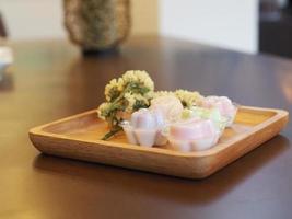 jelly desserts with a set of tea on the table. photo