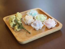 jelly desserts with a set of tea on the table. photo