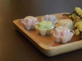 jelly desserts with a set of tea on the table. photo