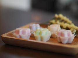 jelly desserts with a set of tea on the table. photo