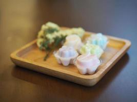 jelly desserts with a set of tea on the table. photo