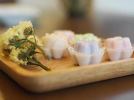 jelly desserts with a set of tea on the table. photo