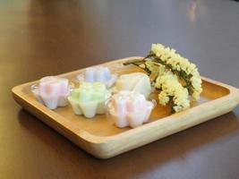 jelly desserts with a set of tea on the table. photo