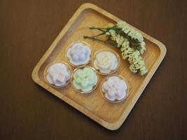 jelly desserts with a set of tea on the table. photo