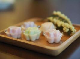 jelly desserts with a set of tea on the table. photo