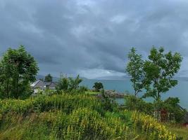 Norway fjords with little red houses at the water's edge 4 photo