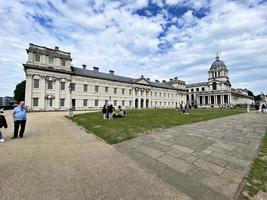 London in the UK in June 2022. Tourists enjoying Greenwich in London photo