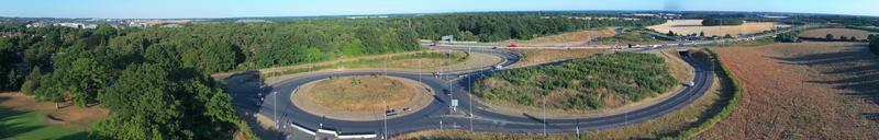 High Angle View of Luton Airport Junction Interchange of Motorways M1 J10 at Luton City of England UK. it is Connection Luton City and London Luton Airport Image Created on 11th August 2022 with Drone photo