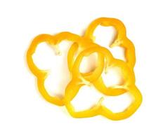 Yellow slice sweet bell pepper isolated on white background photo