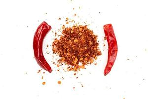 red ground paprika powdered or dry chili pepper isolated on white background photo