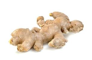 fresh ginger root isolated on white background photo