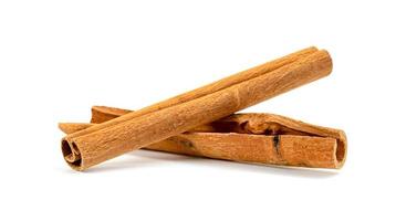 cinnamon sticks isolated on white background photo