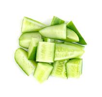 chopped cucumber isolated on white background photo