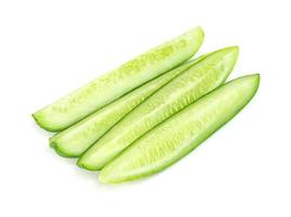 diced cucumber isolated on white background photo