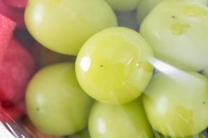 Beautiful boxed Shine Muscat green grape isolated on white background. photo