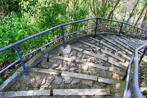 Different outdoor views on concrete, wooden and metal stairways. photo